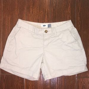 Tan/white khaki shorts.